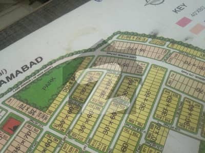 Invester Price , On Main road, Near to Park and Market , Solid, level, Ready For Cunstuction, 10 Marla Plot in V block