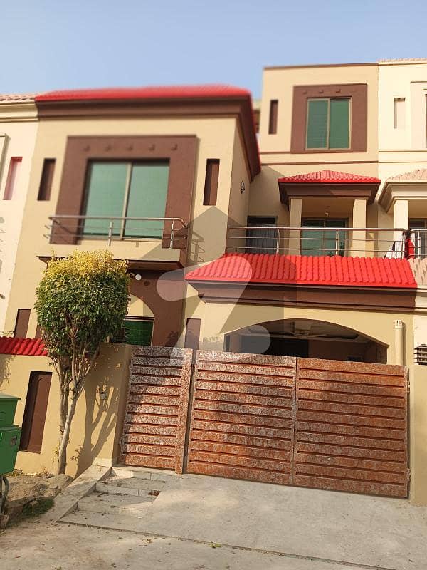 5 Marla Facing Park Like New House Available For Sale In Bahria Town Lahore.