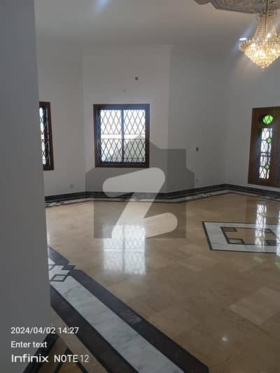 6 Bed Room House With Attached Washroom 2 DD 2 Tv Lounge 1 Kitchen Beautiful Front Lawn 5 Car'S Parking Two Gates