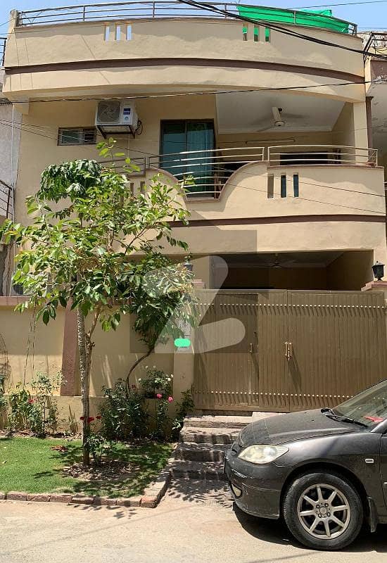 Solid Made Spacious 5 Marla House In Wapda Town. Perfect For Family Use.