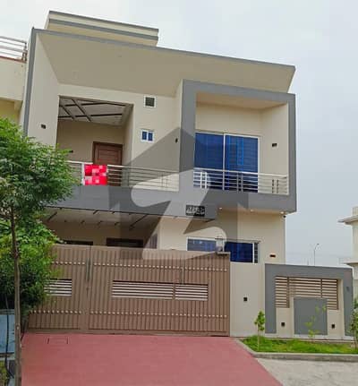 A Brand New Luxury Double Unit 10- Marla House Available For Sale.