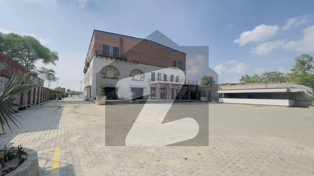 Commercial 8 kanal building with 27000 sqft covered area in the middle of two main Roads
