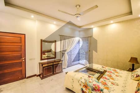 D H A Lahore 1 kanal Mazher Munir Design Fully Furnished House with Swimming Pool with 100% original pics available for Rent