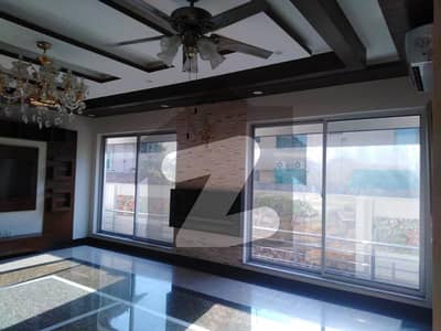 D H A Lahore 1 kanal Brand new Mazher Munir Design House with Full Basement and Swimming Pool with 100% original pics available for Rent