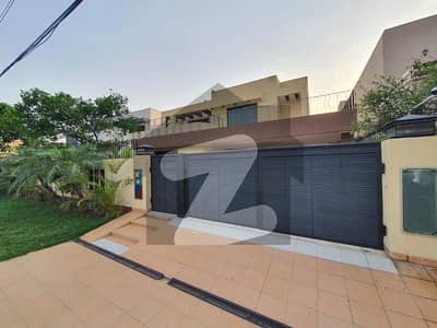 7. "Luxurious 1 Kanal House For Rent - High-End Finishes" IN DHA PHASE 4