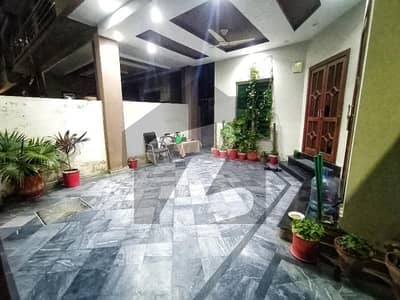 8 marla single storey house 2 bed for sale in block A dha 11 Halloki gardens