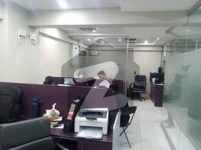 900 sq ft semi furnished office available near main Shahrah e faisal 24/7 building