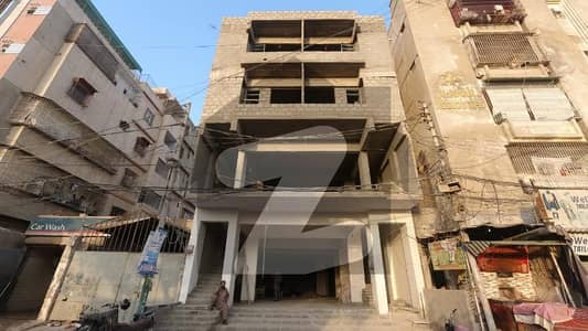 A On Excellent Location Building Of 250 Square Yards In Karachi