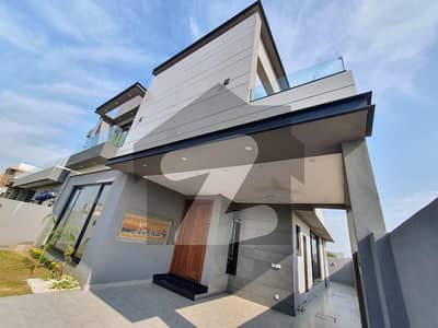 10 MARLA BRAND NEW 150FT ROAD FACING KANAL LUXURY MODERN DESIGN HOUSE FOR SALE IN DHA PHASE 7 100% ORIGINAL PICTURES ATTACHED NEAR PARK AND MCDONALDS. .