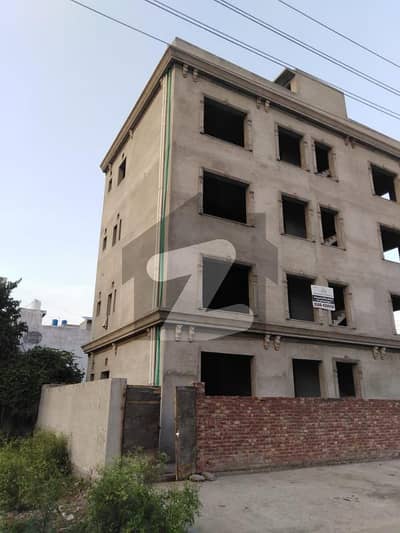 Grey Structure Commercial Building For sale Near to Jubliee Town-Near to indus hospital