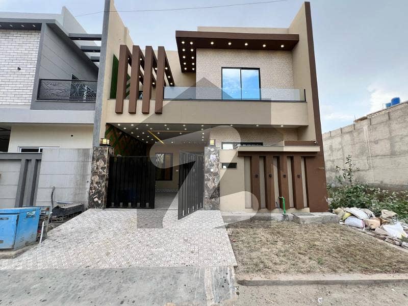 5 Marla Luxury House For sale in Model City 1, E Block, Faisalabad