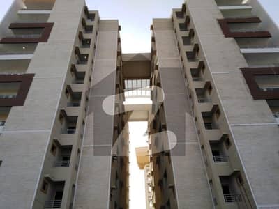 TOWER 1 ROAD FACING FLAT ON PRIME LOCATION AVAILABLE IN NHS KARSAZ KARACHI