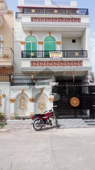 3 marla triple story brand new house for sale Al Rehman garder phase 2 near to Punjab college and park and mosque and commercial hot location