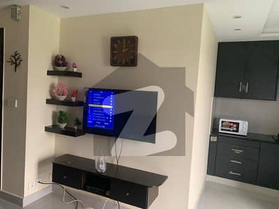 ONE BED BEAUTIFUL BRAND NEW LUXRY FLAT FOR SALE IN SECTOR C BAHRIA TOWN LAHORE