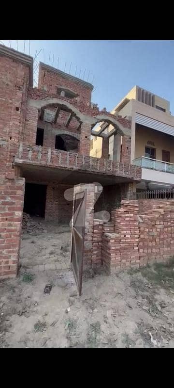 Grey Structure 10 Marla House Available For Sale In Sector E Bahria Town Lahore