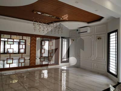 DEFENCE 1000 yards ultramodern stylish bungalow available for rent 5 Master Bedrooms Most Prime And Posh Vicinity Khayaban-e-Jabal Phase 8 Close to Saudi Consulate