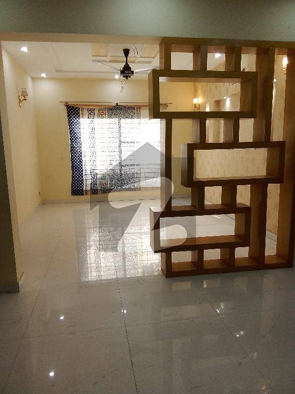 10 MARLA BRAND NEW TYPE TILE FLOORING HOUSE DOUBLE UNIT AVAILABLE FOR RENT AT TARIQ GARDEN