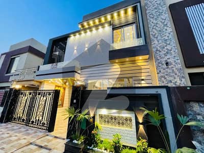 5 Marla furnished beautiful designer brand new lavish house for sale in sector D block main boulevard near commercial market McDonald's demand @310