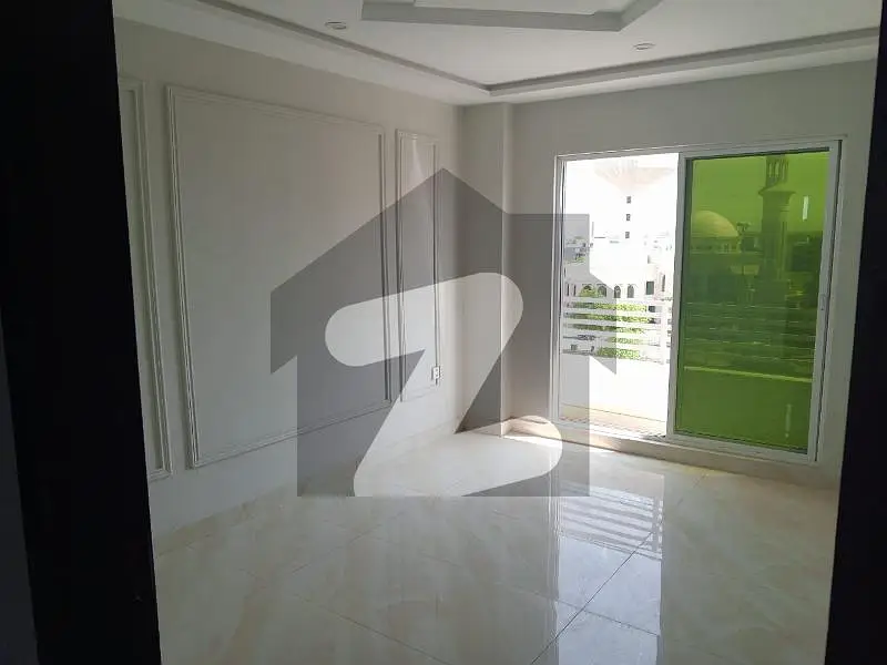 One Bed brand new Flat of front view for sale in very reasonable price in Bahria Town Lahore.