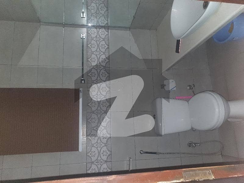 Ground floor residential 2 bed apartment for sale location F-11 Markaz