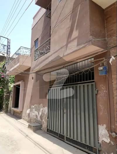 House for rent college Road near women University Madina Town Faisalabad VIP location