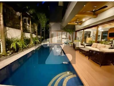 Dha phase 6 2000 yard Artistic design 2+4 bedroom full basement and swimming pool