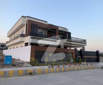 1 Kanal South Facing luxurious house located in street of Masjid, Market and Main Park in sector C is available for sale