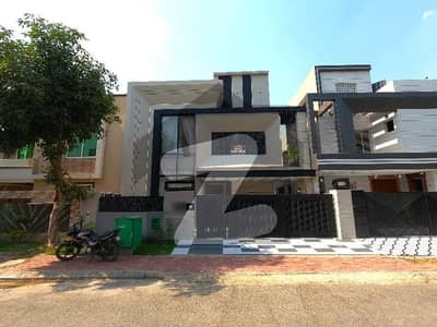 10 Marla House Is Available For Sale In Bahria Town Janiper Block Lahore. this house is as like dream house. construct by A One Builders.