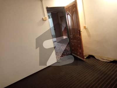 (Hot location)Unfurnished flats2 bed kitchen 2 Bathroom available for rent johar town near emporium Mall