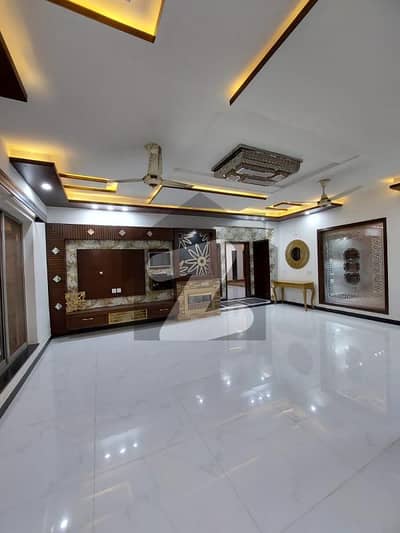 FAISAL TOWN BRAND NEW TEN MARLA DOUBLE STORIES BEAUTIFUL HOUSE FOR SALE IDEAL LOCATION NEAR MAIN ROAD