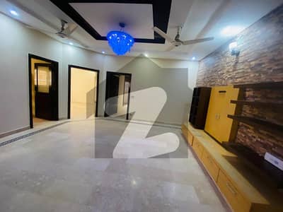 10 Marla House Non Furnished available for Rent in Overseas B Block bahria Town Lahore