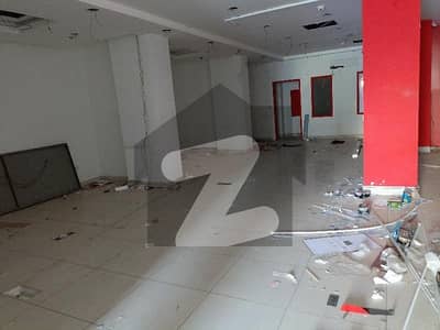 Prime location commercial shop on rent at main Shaheed Milit road