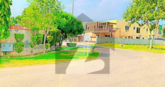 20 Marla Plot Facing Park Available in Phase 6 Block D Close to Main Road Hot Location Surrounding houses