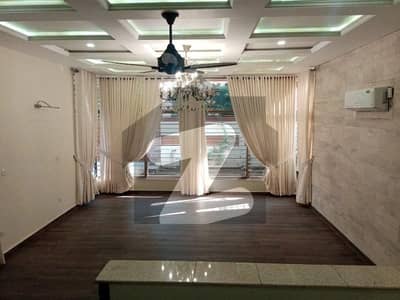 F-7 Sector Luxury Almost Brand New Triple Storey House With 4 Kanal Extra Beautiful Lawn