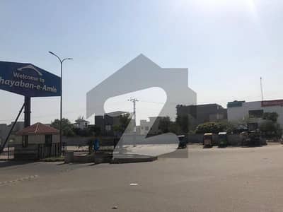 61-MARLA COMMERCIAL PAID PLOT AVAILABLE FOR SALE IN DEFENCE ROAD CORNER PLOT SUPER HOT LOCATION IN DEFENCE ROAD. SINGLE OWNER
