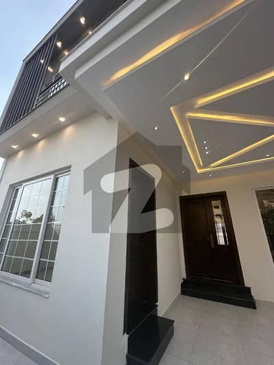 Beautiful 8 Marla House Available For Sale With Front View Open With Huge Green Patch