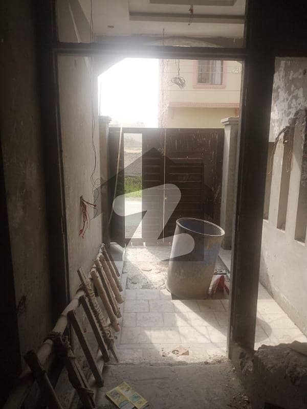 3 Marla Triple storie Gray structure house for sale in Vital Orchard EE