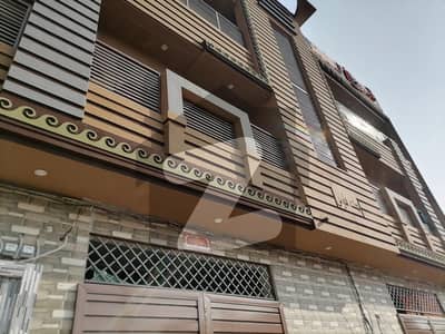 گلبرگ پشاور میں 9 مرلہ عمارت 6.5 کروڑ میں برائے فروخت۔