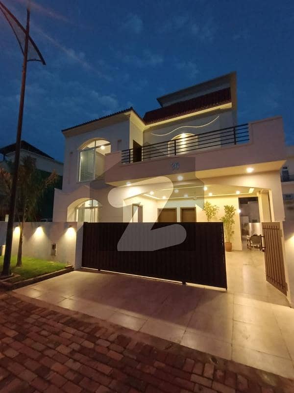 10 Marla Beautiful House Available For Sale just 1 Mnt Drive From the Main Gate! 10 Marla Beautiful House Available For Sale just 1 Mnt Drive From the Main Gate!