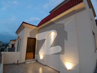 10 Marla Beautiful House Available For Sale just 1 Minutes Drive From the Main Gate!