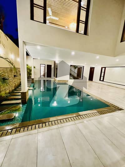 Dha Phase 6 1000 Square Yard Brand New Bungalow 2+4 Bedroom With Swimming Pools Basement Home Theatre Big Car Car Parking Big Lawn Away From Sea To Of The Line House Architect Design Bungalow