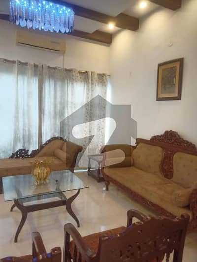 10-Marla Modern Bungalow Fully Furnished with 100&10% Original Pictures in DHA Phase-5 available for Rent