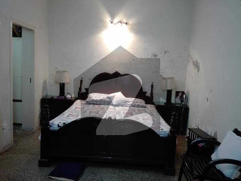 Aesthetic House Of 1 Kanal For sale Is Available Model Town, Lahore