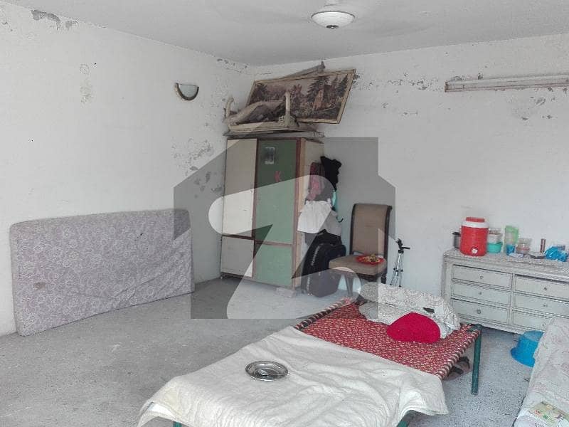 Aesthetic House Of 1 Kanal For sale Is Available Model Town, Lahore