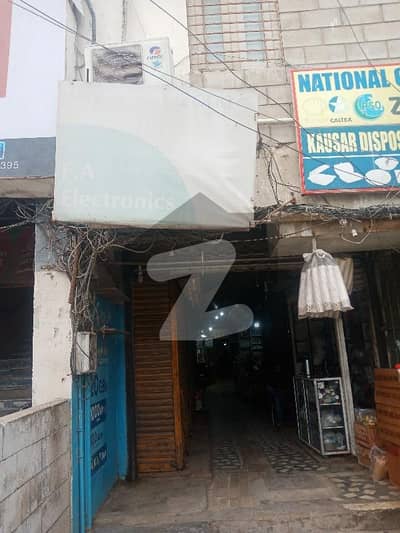 SHOP AVAILABLE FOR RENT IN PUNJAB CHOWRANGI NATIONAL SQUARE MOBILE MARKET NEAR PSO PUMP