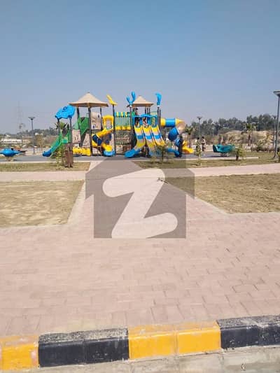 5 Marla Leveled Plot On Main Double Road, Ideal For Living And Save Secure Investment