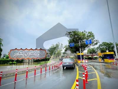 8 Marla Plot for sale in B block with possession utility paid at brilliant location in bahria orchard lahore at brilliant location