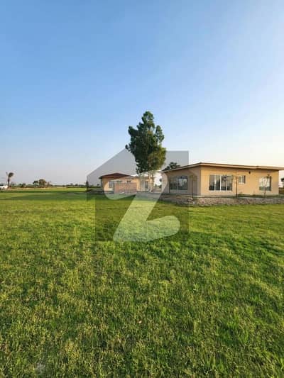 "Impeccable 4-Kanal Entertainment-Ready Farmhouse With Pool And Scenic Beauty In DHA Phase 10, Easy Deal With EMPIRE Estate"