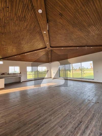 "Impeccable 4-Kanal Entertainment-Ready Farmhouse With Pool And Scenic Beauty In DHA Phase 10, Easy Deal With EMPIRE Estate"