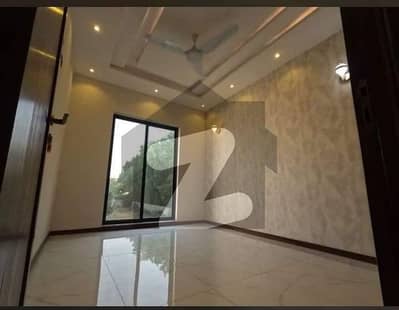 Fully Basement 5-Marla House in DHA Phase 9 Town with 4 Bedrooms, Basement & Servant Quarter for Rent Contact Wall Green Realtors for Easy Deal